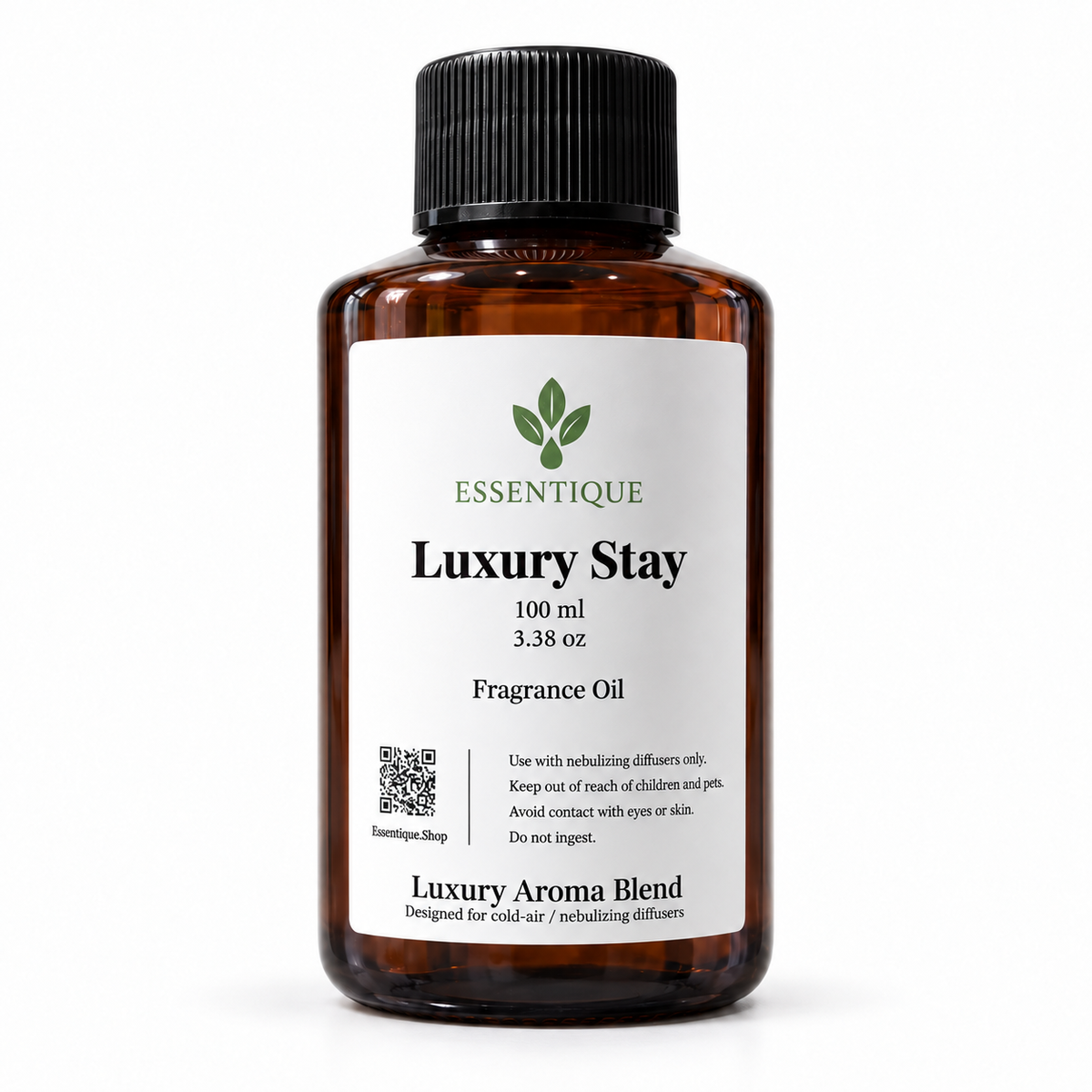 Essentique Luxury Stay 100 mL fragrance oil in
an amber bottle with a black cap and white
front label on a white background.